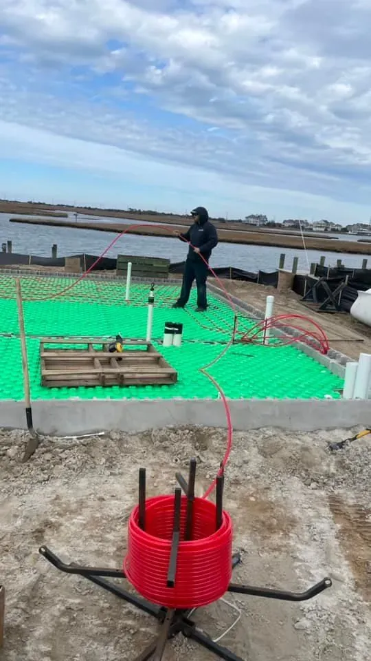 Radiant floor PEX tubing layout at waterfront job site